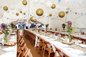 Weddings & Celebrations at Pekes Manor. Inside a marquee on Ducks Lawn. 