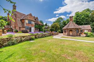Tudor View at Pekes Manor - The Manor House stands on the left.